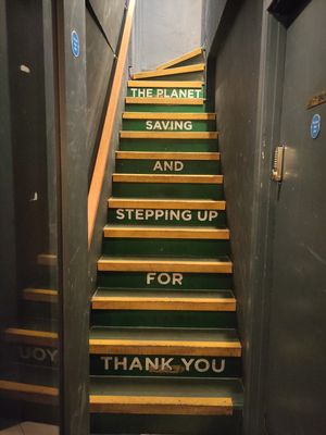 Stairs to basement seating at Neat - Soho in London