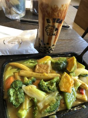 Pumpkin tofu curry and brown sugar boba tea   at Vegan Deadly Sins in Sacramento
