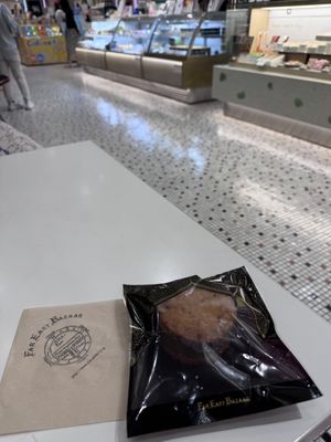 Find table across the booths or there is bench by bathroom    at Far East Bazaar - Shibuya in Tokyo