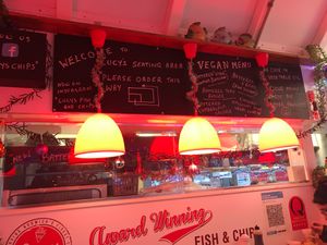 Vegan menu in seating area at Lucy's Chips in Norwich