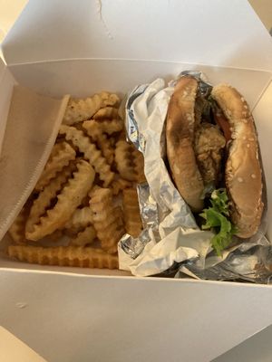 Fried mushroom burger with fries at Dee's Vegan To-Go in Charlotte