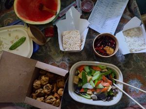 Watermelon first! Haha then feast! at Cozy Wok in Oakland