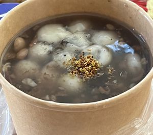Sesame rice balls in Eight Treasures porridge ❤️  at Cozy Wok in Oakland