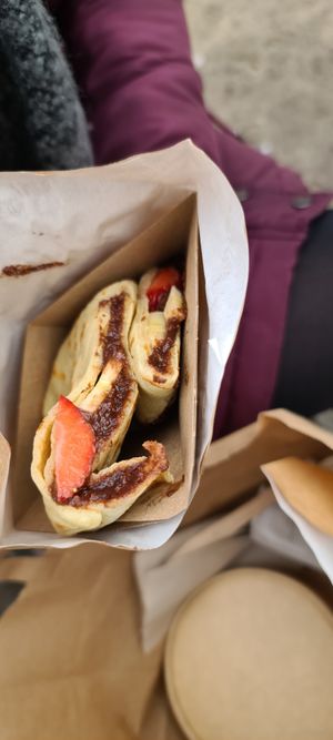 Sweet crepe with vegan 🍫 spread, 🍌and 🍓 at Vegins in Frankfurt