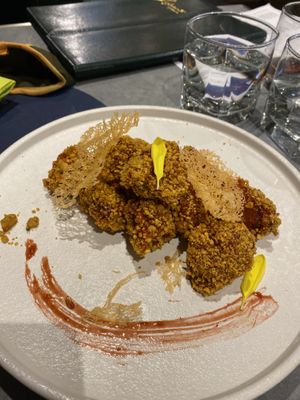 Signature sweet and spicy “pork” bites (made from hedgehog shrooms) at Emerald 珺 in Hong Kong Island