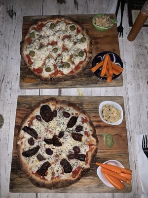 Margarita and Mediterranean pizzas at Layla Restaurant Plants & Mushrooms in Puerto Morelos