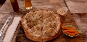 Onion pizza at Layla Restaurant Plants & Mushrooms in Puerto Morelos