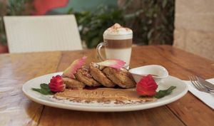 Gluten-free & vegan hotcakes with plant based cappuccino! Can you find a better breakfast? at Layla Restaurant Plants & Mushrooms in Puerto Morelos