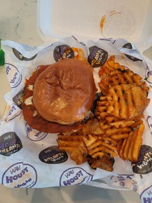 Already took a few bites out of the Magic City Chicken Sandwich at Houstatlantavegan in Houston