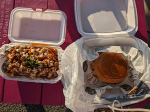 here are the burger and fries next to each other. I ended up having to save the burger for home because I got full from the fries alone. Very delicious as always. 💜 at Houstatlantavegan in Houston