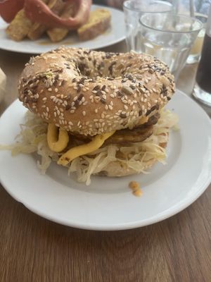 tempeh bagel with sauerkraut and a cheesy sauce 😋😋😋😋😋  at Radikalecker in Berlin