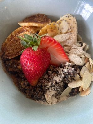 Quinoa porridge with fruit & spiced chai. at Roots Cafe & Deli in Dolphin Coast