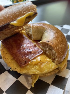 The Original breakfast sandwich- vegan cheese, vegan egg, vegan bacon on a bagel   at Hollycake House in East Rochester