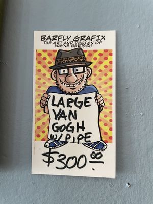 Artist info for the paintings at Nine Lives Cat Café in Indianapolis