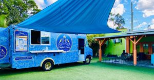Food to go or enjoy eating under the covered patio area. at Hamlet's Eatery  in Sarasota
