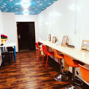 The blue wall-side enter has a little eat-in space.  at Falafel Time in Osaka