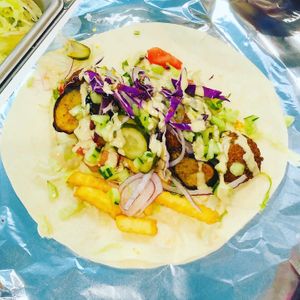 Healthy falafel wrap-roll sandwich 
with 100%sesame sauce at Falafel Time in Osaka