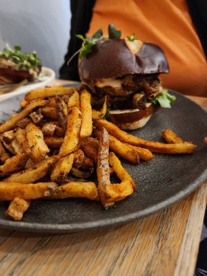 Smash burger with fries at Aunts et Uncles in Brooklyn
