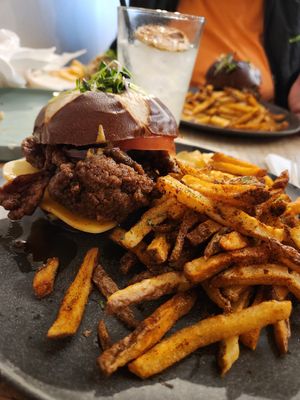 Chicken sandwich with fries at Aunts et Uncles in Brooklyn