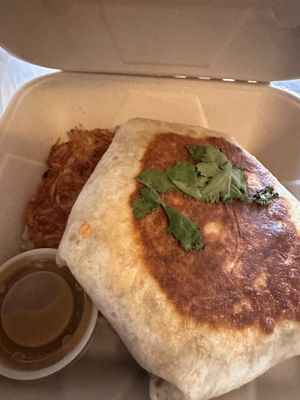 Crunchwrap with hashbrowns   at The Nucleus in Eau Claire