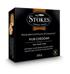 Blended with dark beer and chives. This semi-firm cultured cashew cheese wheel boasts a bold, robust, full-flavour that satisfies any savoury craving. Try pairing with beer. at Vegan Stokes Cheese in Markham