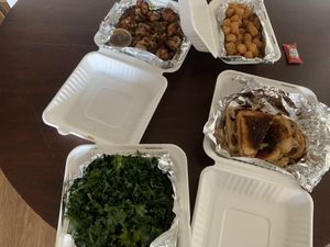A feast! Kale salad, mushroom grilled cheese, cauliflower wings and tots  at Galaxy Hut in Arlington