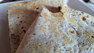 Quesadilla - vegan chorizo, roasted red pepper, caramelized onion, kale, chipotle aioli, vegan queso at Galaxy Hut in Arlington