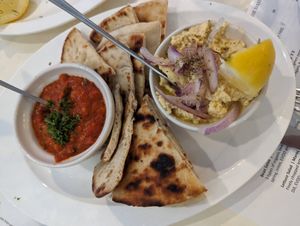 Yellow Lentil and Roasted Red Pepper Dip with Fresh Warm Pita at Blu Kouzina in Sarasota
