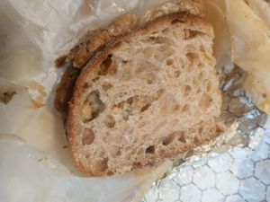 Seitan melt. Every part of it was phenomenal-the bread, the seitan, the vegan cheese, pickles, and the shmear. The best sandwich I've ever had and I've been vegan 37 years. I grew  at Allegro Bakery in Pittsburgh