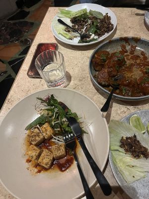Already ate half the meal but we got the crispy tofu, potato bravados, and san choy bow  at Monster Kitchen and Bar in Canberra