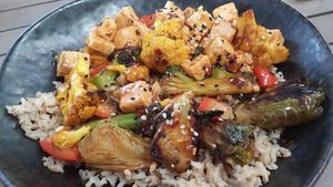 Orange Cauliflower Bowl with tofu added at Lake Park Diner in Naples