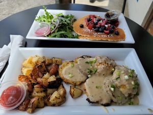 Biscuits & Gravy w/potatoes and Pancakes w/fruit at Brunch Bird in Austin
