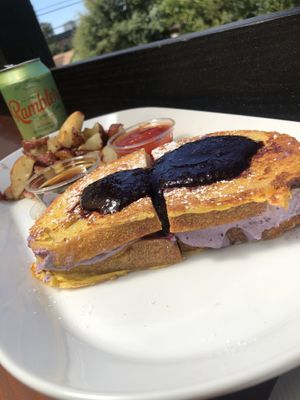 Stuffed French Toast with Garlic Rosemary Red Potatoes..  at Brunch Bird in Austin