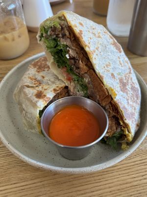 Asada Crunchwrap with breakfast hot sauce   at Rascal's in Santa Barbara
