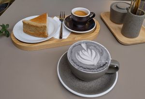 Flan, double espresso, charcoal latte at Graines du Jour in Paris