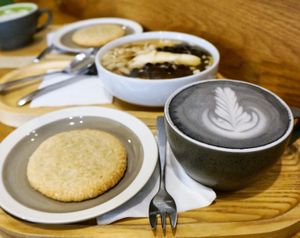 Almond cookie + Charcoal Latte + Fleur de Tofu at Graines du Jour in Paris
