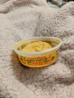 Fiesta cheese dip, in the refrigerated cheese department, is vegan at Trader Joe's in Reno