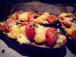 Filled eggplants with polenta, tomatoes and fresh parsley at Orðakaffi in Akureyri