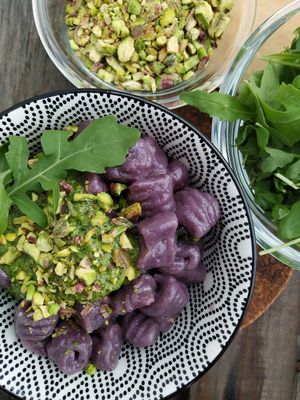 Purple potato gnocchi with pistachio and rocket pesto  at Orðakaffi in Akureyri