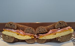 vegan bacon, cheese, and egg on a pumpernickel bagel at Spielman Bagels and Coffee Roasters in Portland
