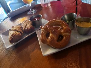 Cheesesteak egg rolls and pretzels with beer cheese at Monster Vegan in Philadelphia