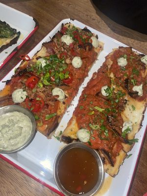 First of 2 bbq options sorry cant remember the name! The one with the ranch, in 2 parts as i opted for no chilli pepper or onion.   at Four Side Vegan Pizza in Manchester