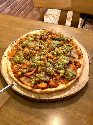 Gluten-free Tikka masala  pizza (pretty good!) at Carrots The Vegan Kitchen in Bangkok