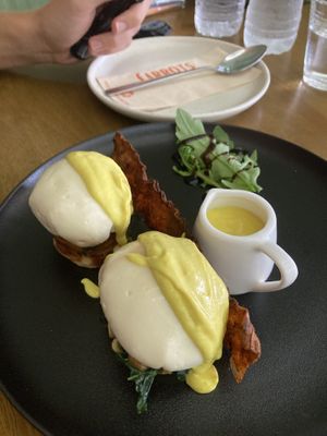 Eggs Benedict with barely visible muffins  at Carrots The Vegan Kitchen in Bangkok