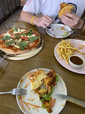 Margherita pizza and lentil burger   at Carrots The Vegan Kitchen in Bangkok