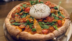 Buffalo pizza with running mozarela cheese   at Carrots The Vegan Kitchen in Bangkok