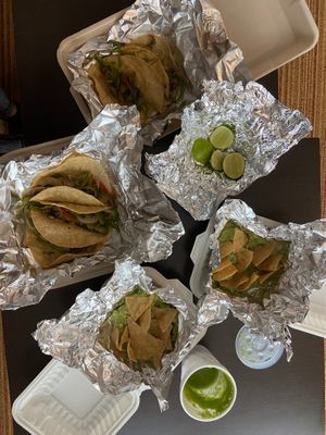 Tacos, chips and guacamole and tomatillo salsa at MEX - Cucara Macara in Mexico City