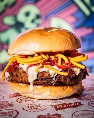 BURGALOO 2-Roat potato and white onion patty, pink onions, lime pickle, soy yogurt, red chili and sev jini. at MEATliquor in Croydon