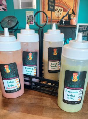 All sauces are vegan, mild to extra hot. at Comālli Taqueria in Reading