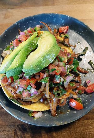 Mushroom tostada, automatically vegan   at Comālli Taqueria in Reading